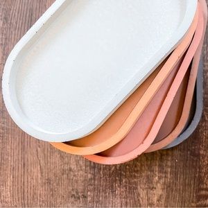 Bundle of 2-  Concrete oval catch tray (1 terracotta and 1 spice)